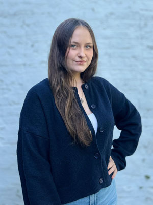 Chloé van Damme, agent immobilier junior, photographe de l'agence Immo Renier